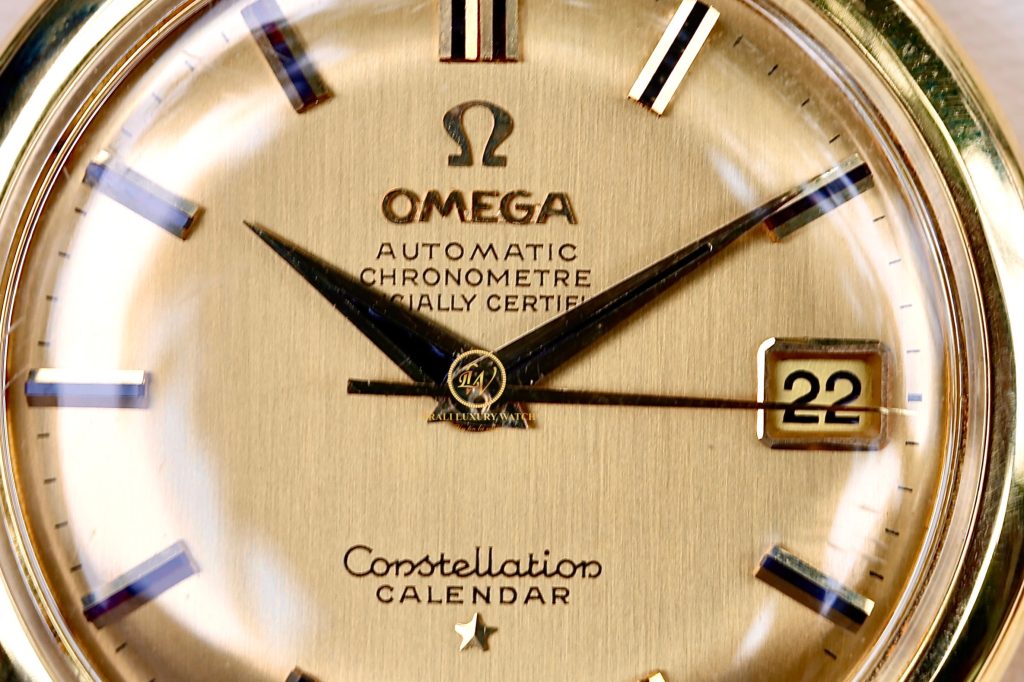 Đồng hồ nam vintage Omega Constellation bát úp mặt vàng, dây vàng 18k cọc đá đen 